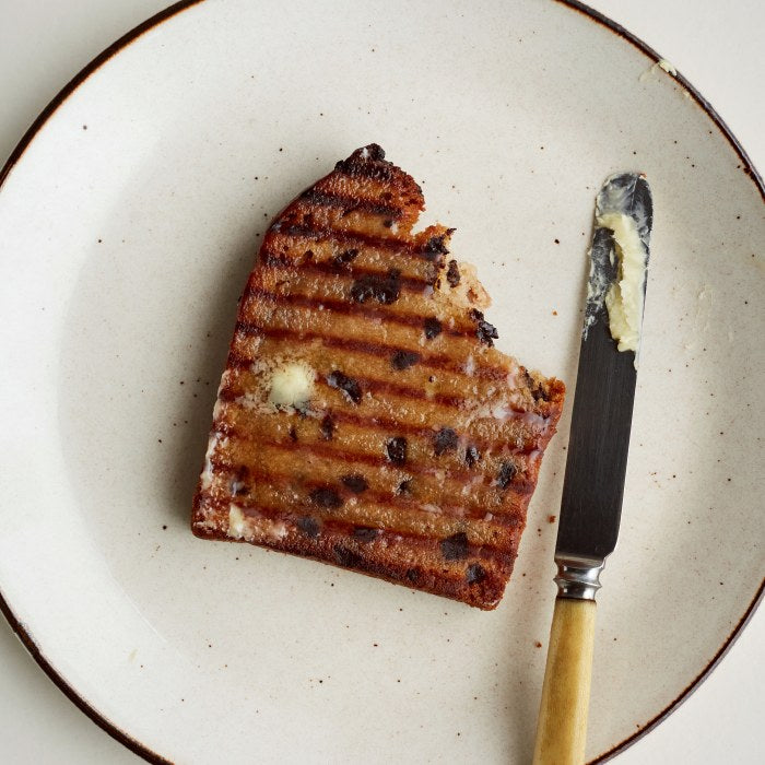 Vegan Banana Bread portion on plate. Wholesale.