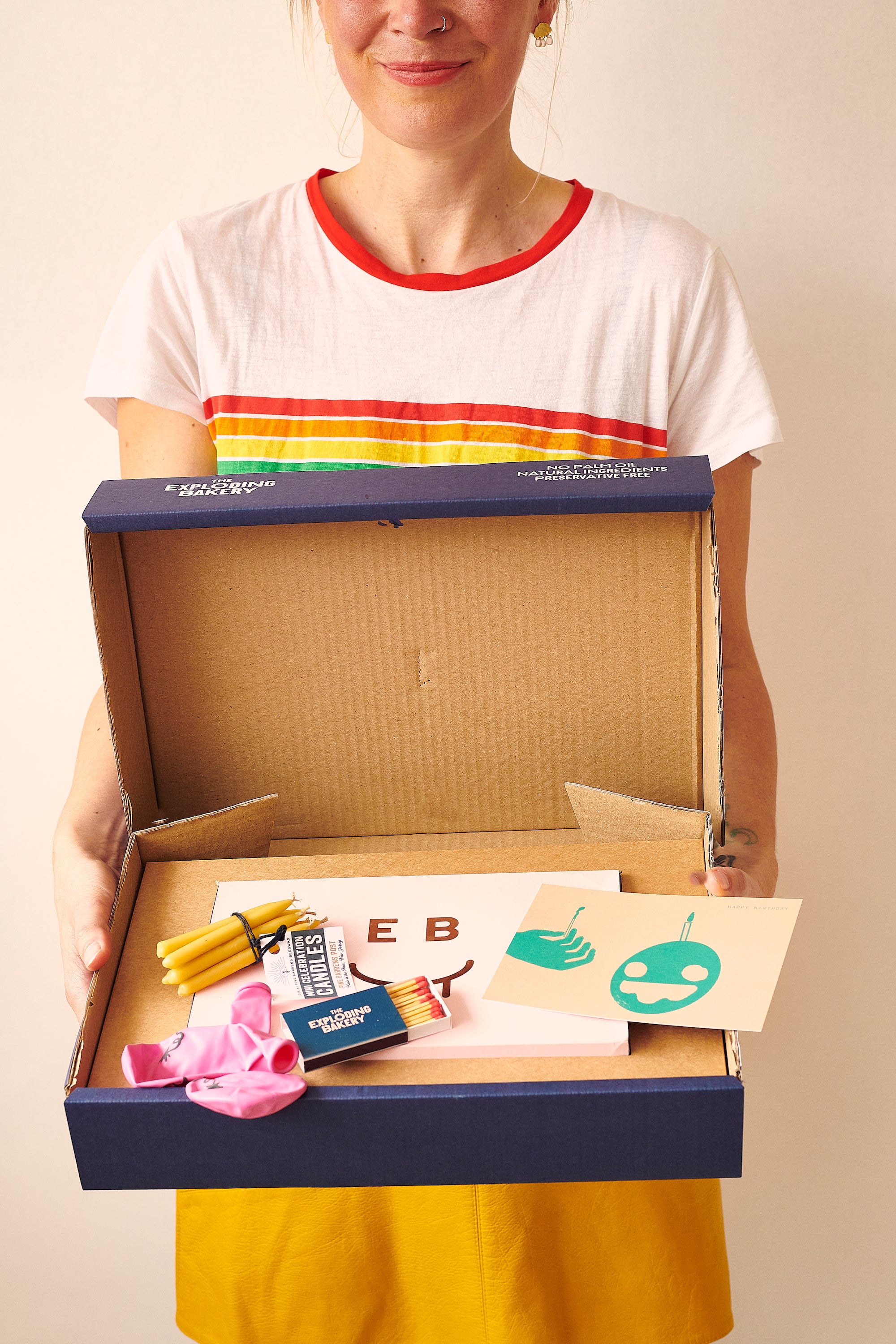 Woman Holding a Birthday Gift Box