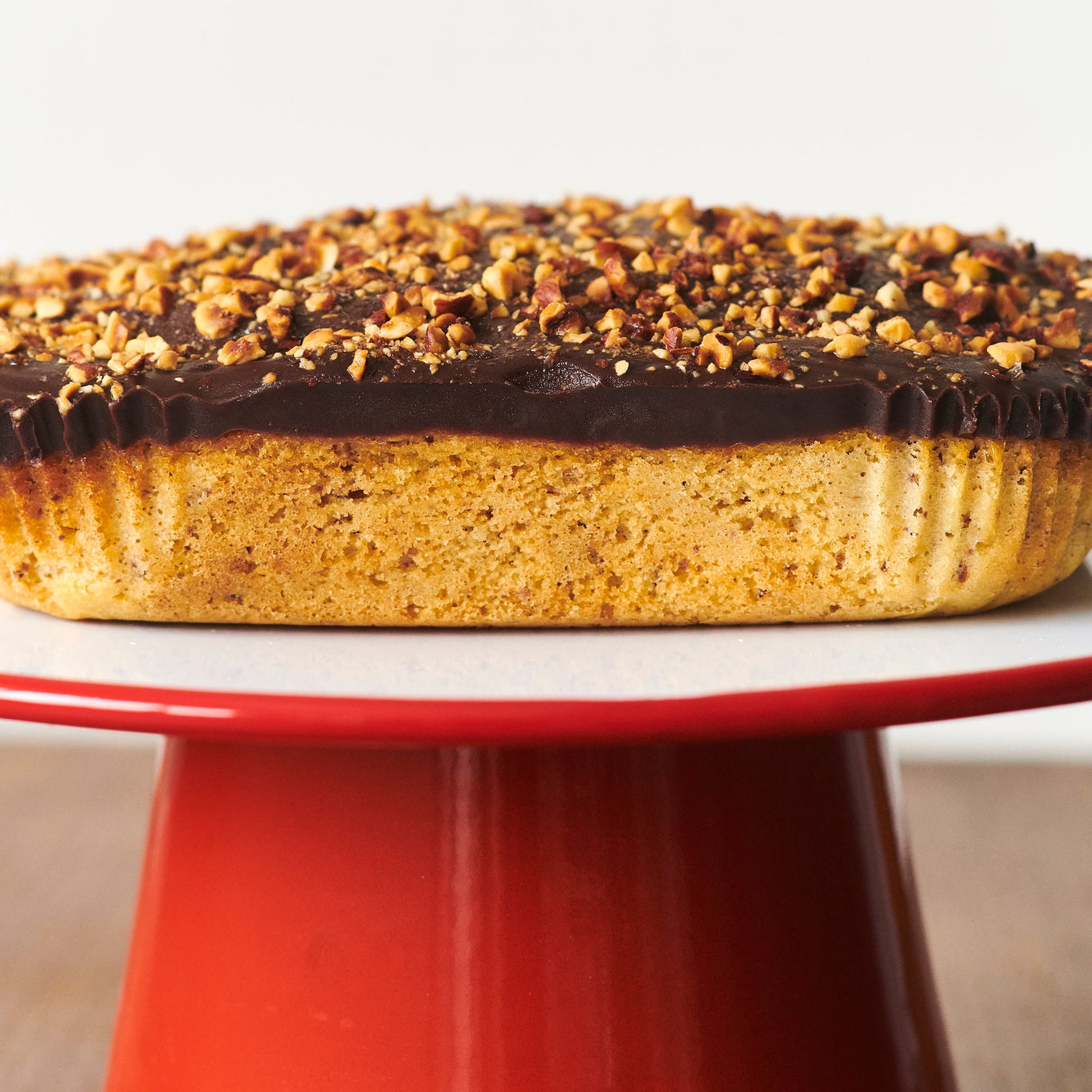 Exploding Bakery Ambassador's Cake on a Falcon Enamel Cake Stand close up