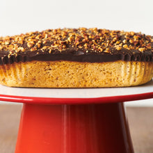 Exploding Bakery Ambassador's Cake on a Falcon Enamel Cake Stand close up