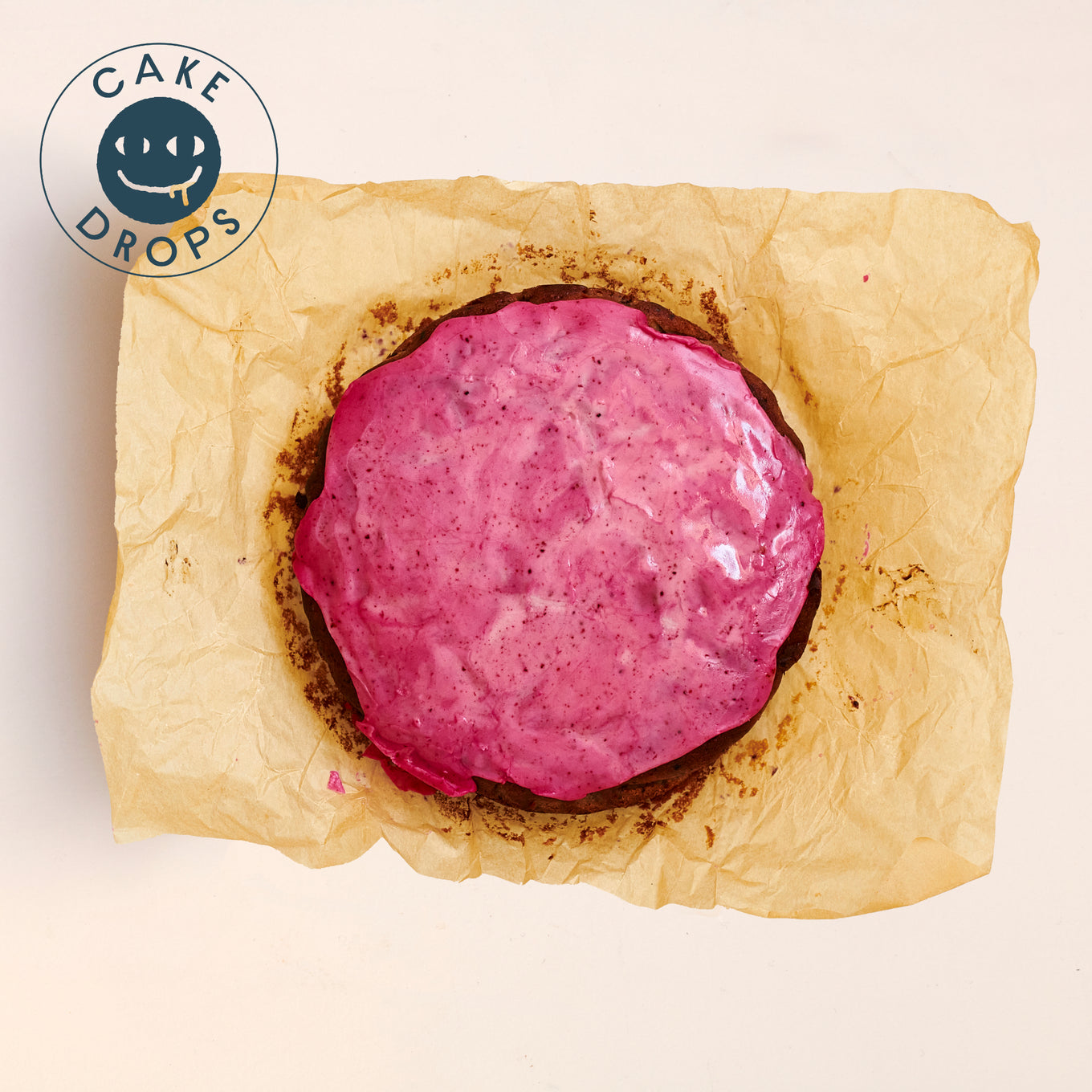 Blueberry Cake photographed from above on greaseproof paper.