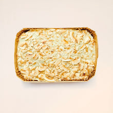 Hummingbird cake with pecans on top photographed from above