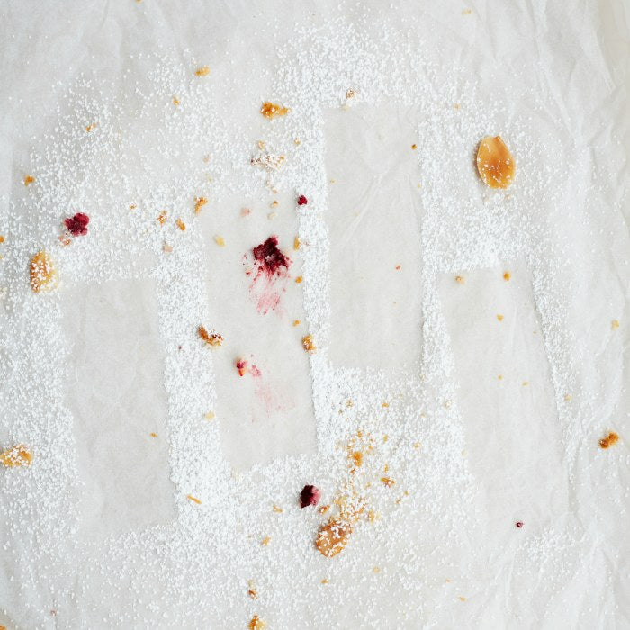 Icing sugar dusted on a table.