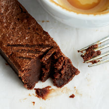 An Exploding Bakery Almond Brownie Traybake portion with fork.