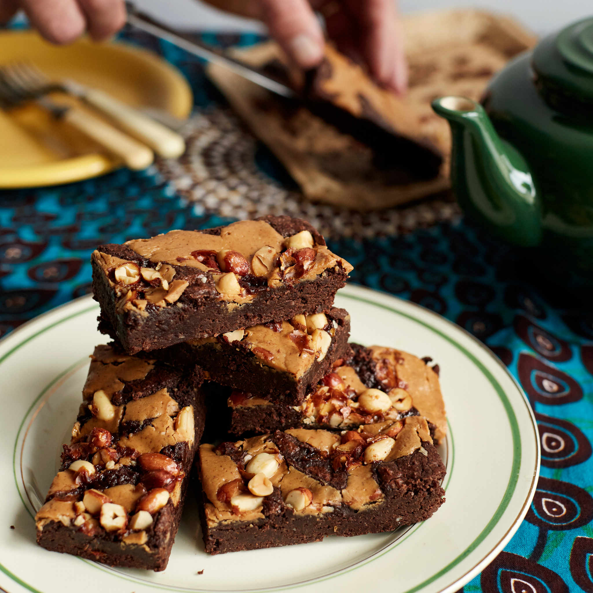 Exploding Bakery Peanut Butter Letterbox Brownie cut up into portions.