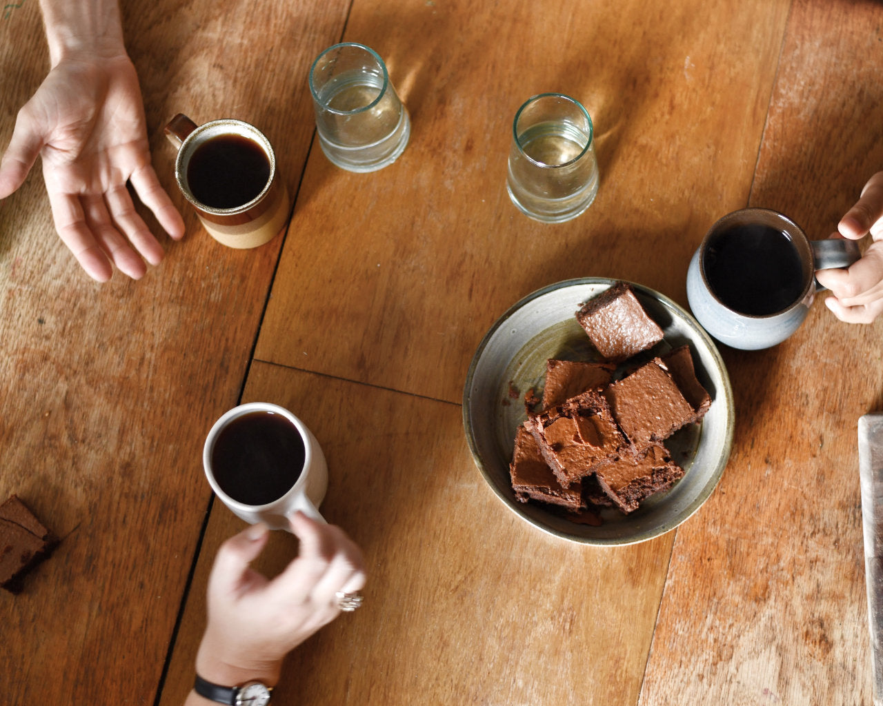 People enjoying speciality coffee from the Exploding Bakery and Roundhill.