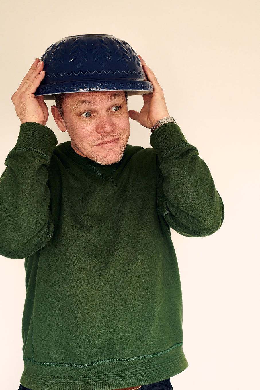 Someone with Exploding Bakery Navy Blue Mixing Bowl on their head