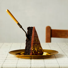 A Plated Slice Of Chocolate Fudge Cake