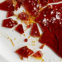 Shattered caramel with salt sprinkled on top.